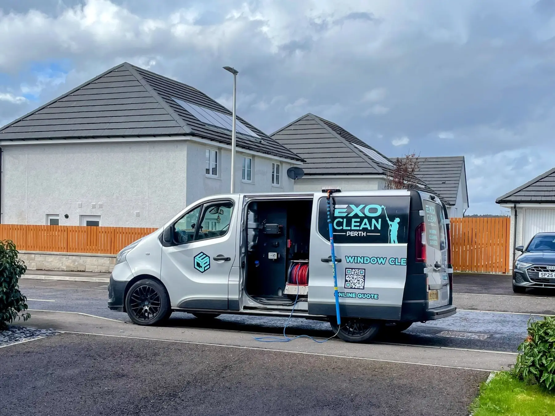 The ExoClean van beside a new-build home in the Almond Valley, Huntingtower