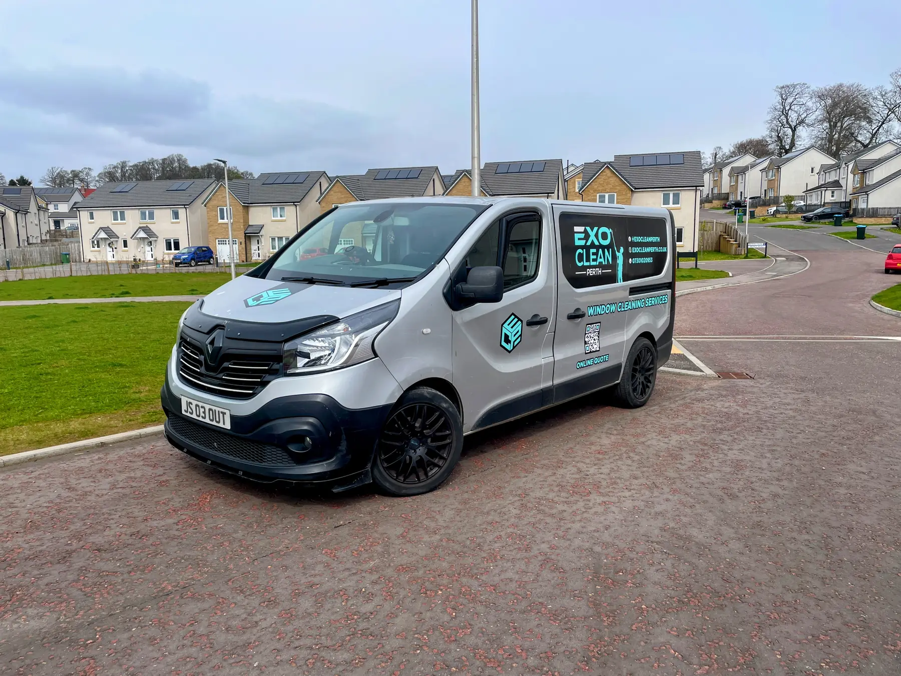 The ExoClean van parked on a residential street