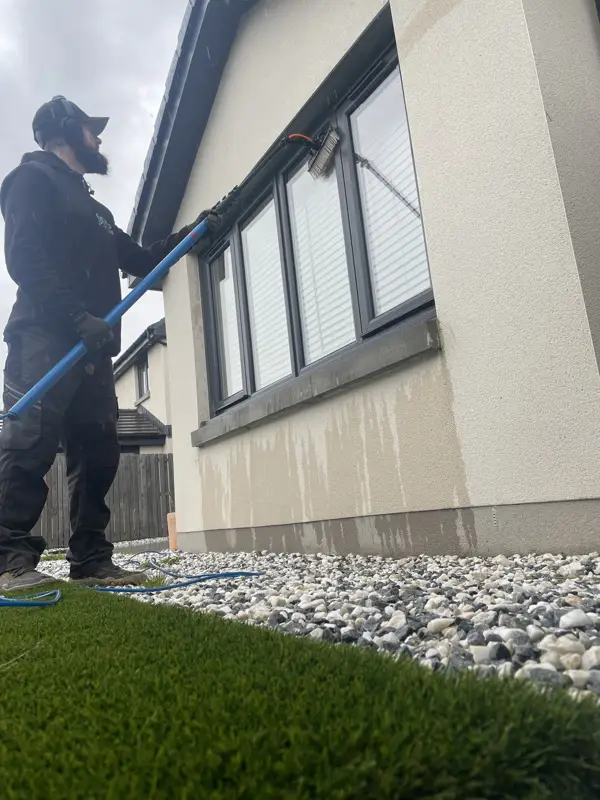 Cleaning windows on a new-build house